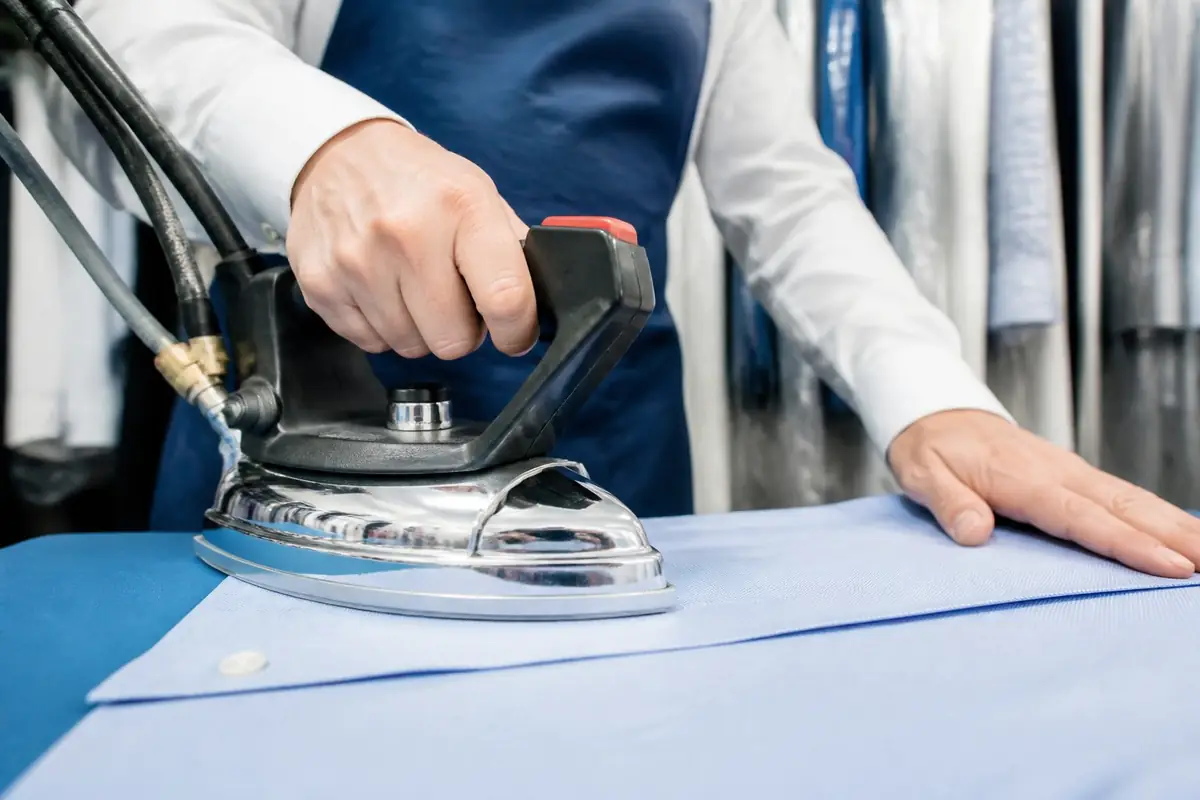 dry-cleaners - hands-operating