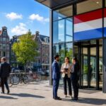 A modern Dutch bank building with business professionals outside, bicycles parked nearby, and traditional canal-side buildings in the background.