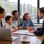 A family of four talking with a legal advisor in an office with a view of Amsterdam canals.