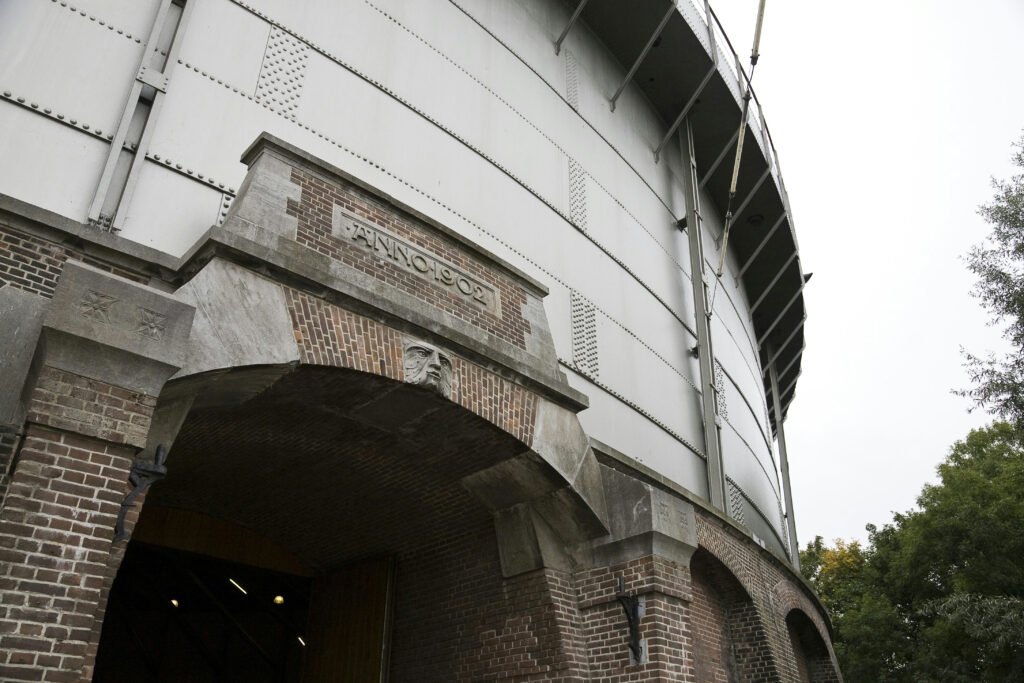 The brick and steel entrance of the Gashouder at Westergasfabriek in Amsterdam