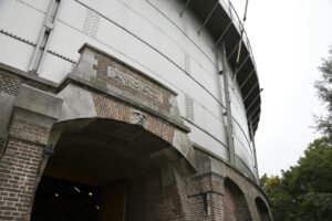 The brick and steel entrance of the Gashouder at Westergasfabriek in Amsterdam