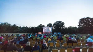 Open-air film screening at dusk