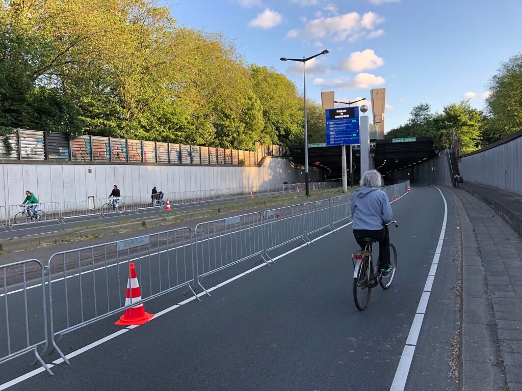 Cyclists in the IJtunnel