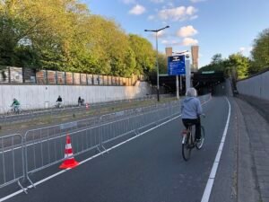 Cyclists in the IJtunnel