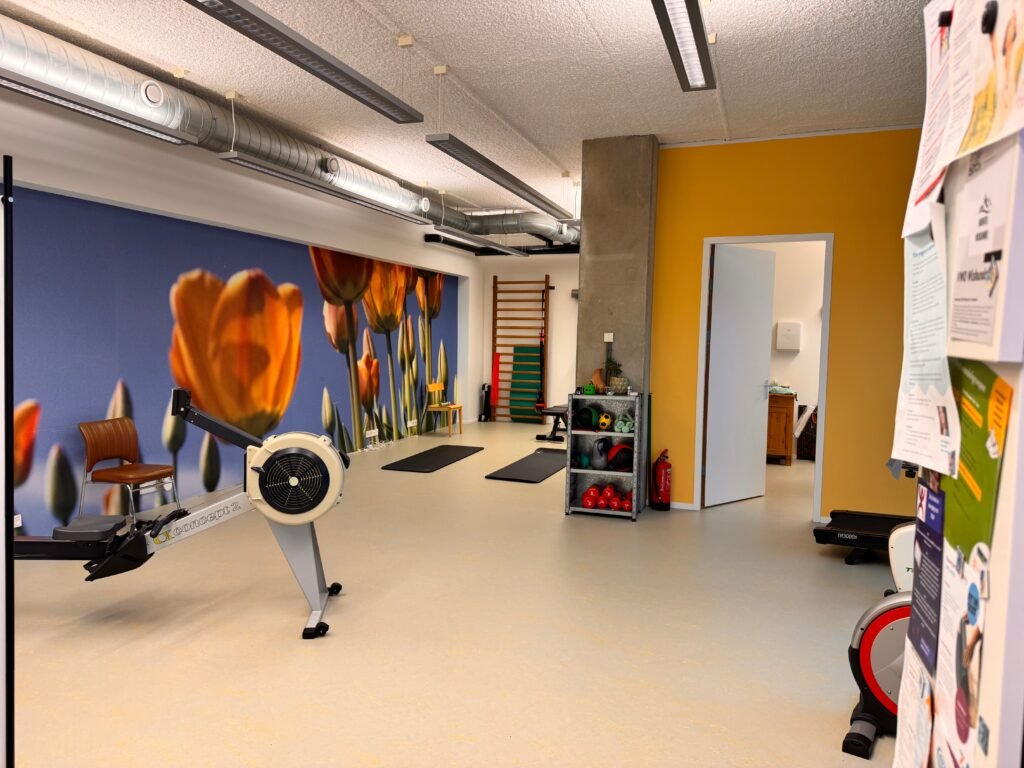 Small-group strength and conditioning led by a physical therapist