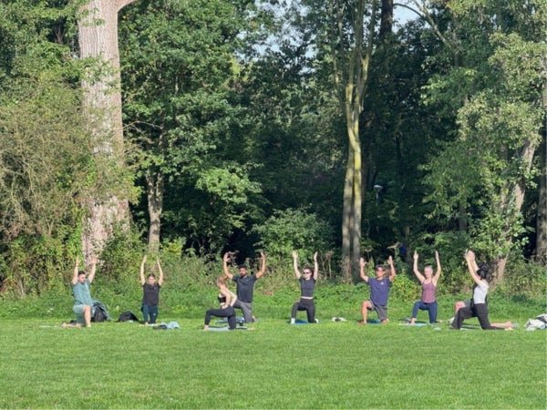 Outdoor mindful movement and breathwork beside the Vondelpark Rosarium