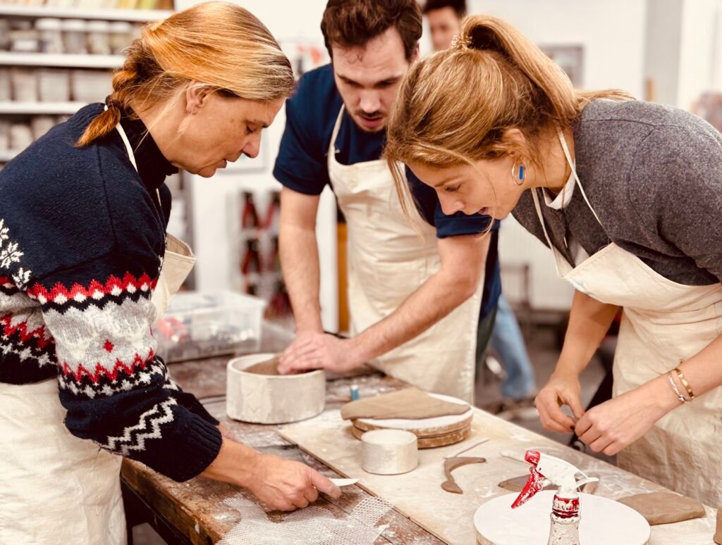 Hand-building shapes and textures in clay workshop