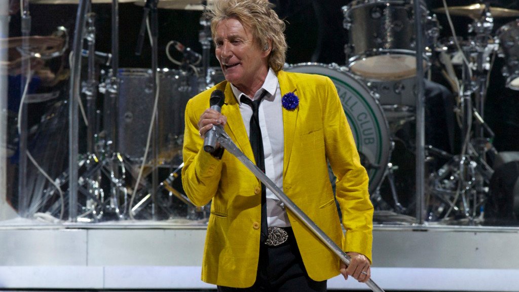 Rod Stewart performing on stage