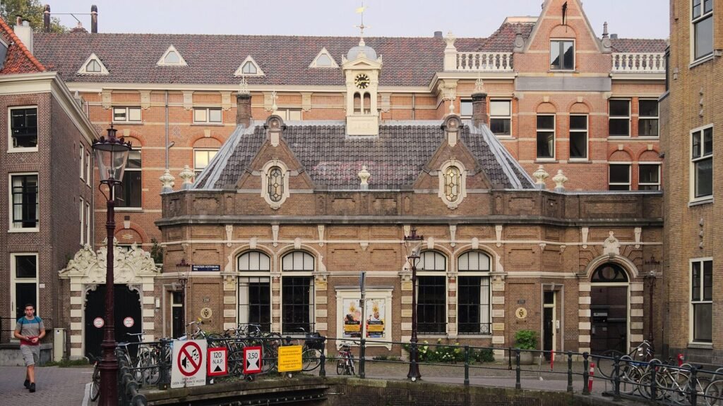 A University of Amsterdam building beside a canal
