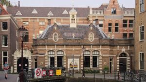 A University of Amsterdam building beside a canal