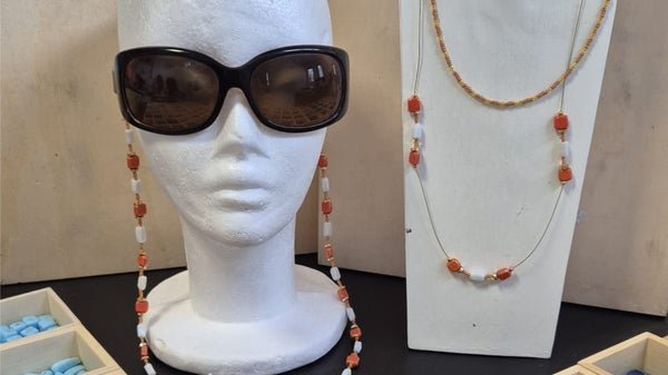 Colourful beads become necklaces, bracelets and keychains