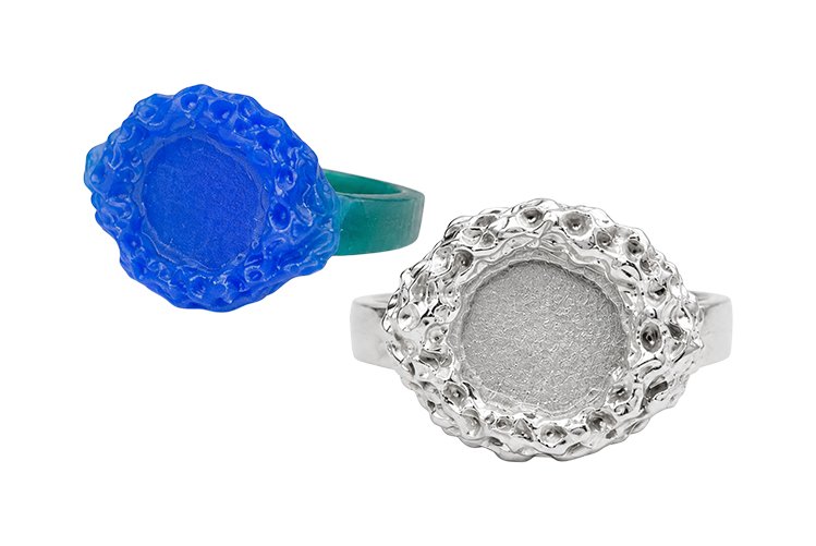The Lost-Wax Ring Workshop models a custom silver ring