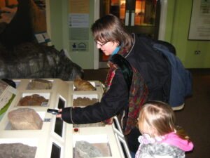 Derby_Museum_visitor_uses_QR_Code-1