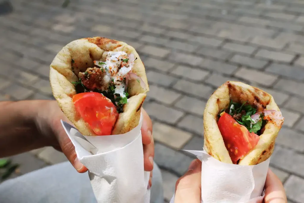 Two pita souvlaki wraps with tzatziki